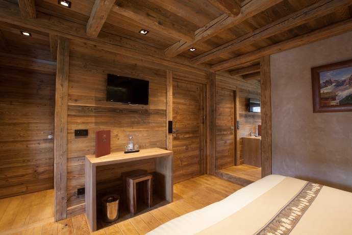 Imagen de la habitación del Hotel Au Coin Du Feu. Foto 3