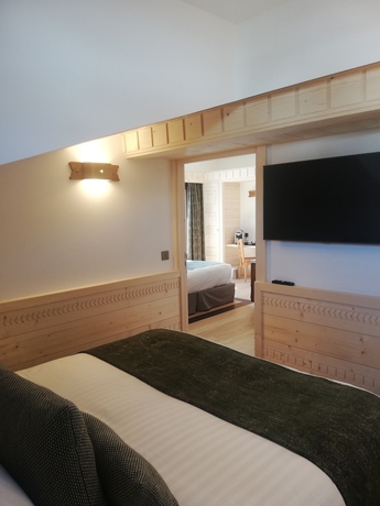 Imagen de la habitación del Hotel Au Coin Du Feu. Foto 6