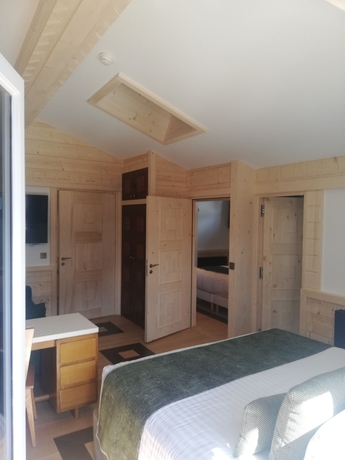 Imagen de la habitación del Hotel Au Coin Du Feu. Foto 7