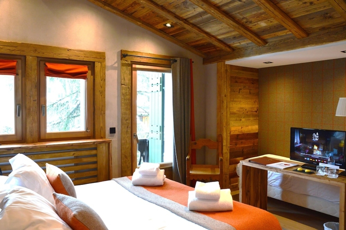 Imagen de la habitación del Hotel Au Coin Du Feu. Foto 8