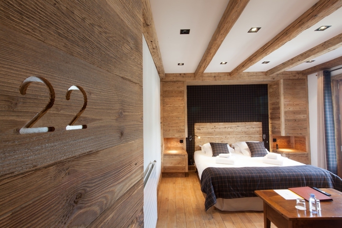 Imagen de la habitación del Hotel Au Coin Du Feu. Foto 9