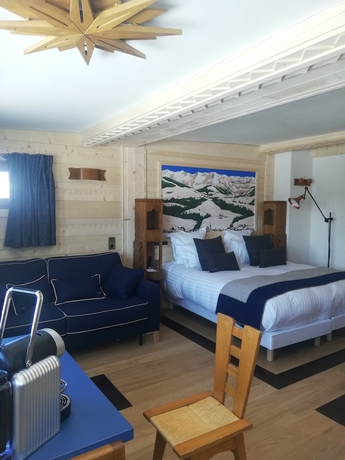 Imagen de la habitación del Hotel Au Coin Du Feu. Foto 10