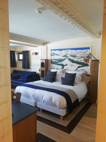 Imagen de la habitación del Hotel Au Coin Du Feu. Foto 11