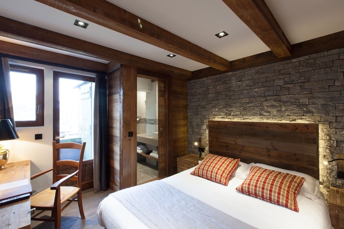 Imagen de la habitación del Hotel Au Coin Du Feu. Foto 13