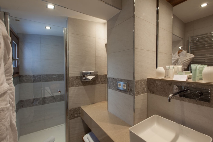 Imagen de la habitación del Hotel Au Coin Du Feu. Foto 14