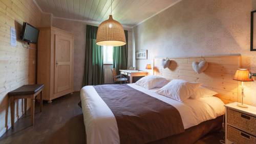 Imagen de la habitación del Hotel Au Cygne. Foto 5