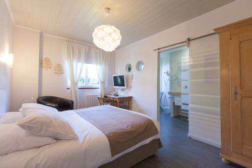 Imagen de la habitación del Hotel Au Cygne. Foto 6