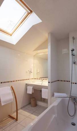 Imagen de la habitación del Hotel Au Cygne. Foto 8