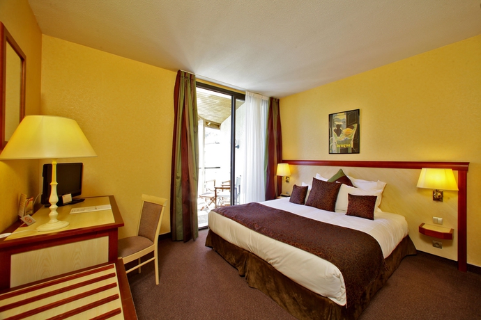 Imagen de la habitación del Hotel Au Grand De Sarlat. Foto 3