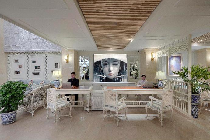 Imagen de los interiores del Hotel Au Lac Charner. Foto 16