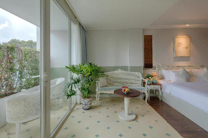 Imagen de la habitación del Hotel Au Lac Charner. Foto 7