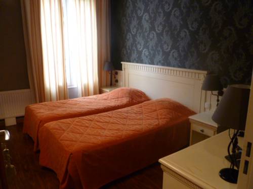 Imagen de la habitación del Hotel Au Limousin. Foto 1