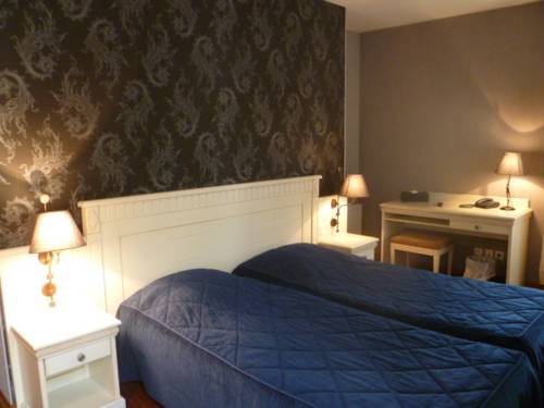 Imagen de la habitación del Hotel Au Limousin. Foto 3