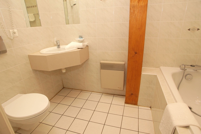 Imagen de la habitación del Hotel Au Lion. Foto 5