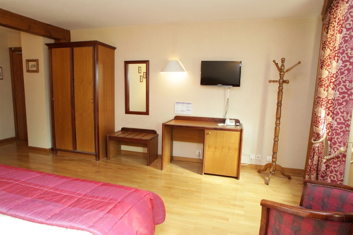 Imagen de la habitación del Hotel Au Lion. Foto 8