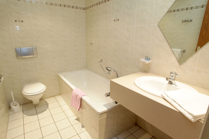 Imagen de la habitación del Hotel Au Lion. Foto 12