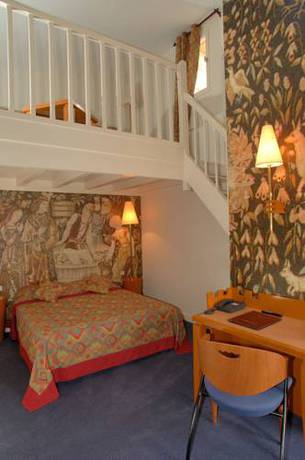 Imagen de la habitación del Hotel Au Logis Des Remparts. Foto 5