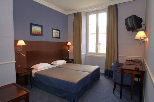 Imagen de la habitación del Hotel Au Logis Des Remparts. Foto 11