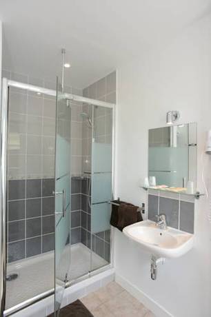 Imagen de la habitación del Hotel Au Moyne De Saire. Foto 9