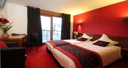 Imagen de la habitación del Hotel Au Nid De Cigognes. Foto 8