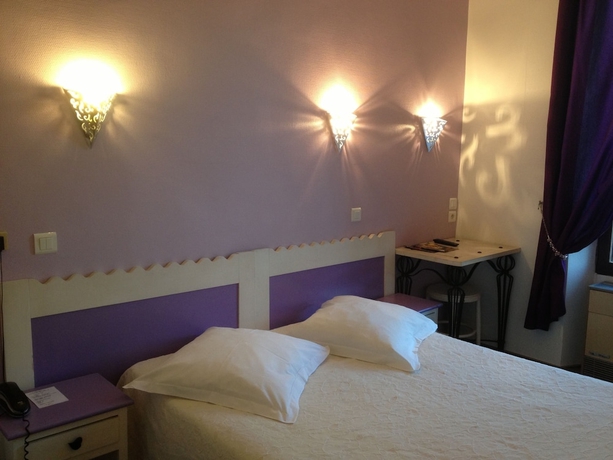 Imagen de la habitación del Hotel Au Nouvel. Foto 6