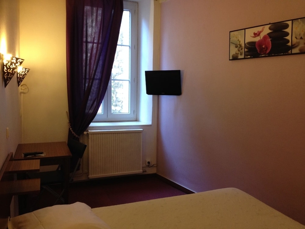 Imagen de la habitación del Hotel Au Nouvel. Foto 9