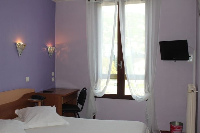 Imagen de la habitación del Hotel Au Nouvel. Foto 12