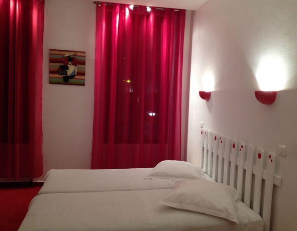 Imagen de la habitación del Hotel Au Nouvel. Foto 13