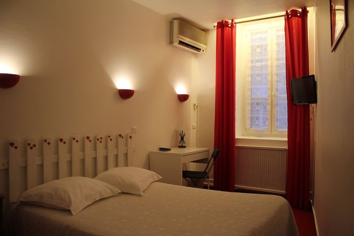 Imagen de la habitación del Hotel Au Nouvel. Foto 14