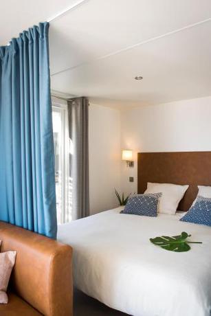 Imagen de la habitación del Hotel Au Paradis des Campeurs. Foto 8
