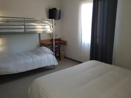 Imagen de la habitación del Hotel Au P&eacute;rigord Noir. Foto 9