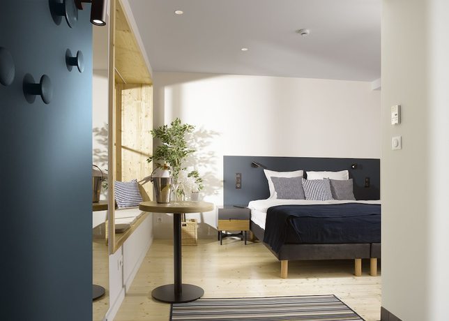 Imagen de la habitación del Hotel Au Petit Pont. Foto 20