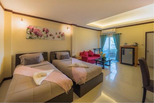 Imagen de la habitación del Hotel Au Place. Foto 9