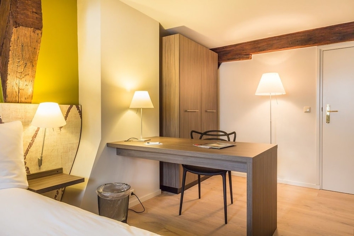 Imagen de la habitación del Hotel Au Quartier. Foto 10