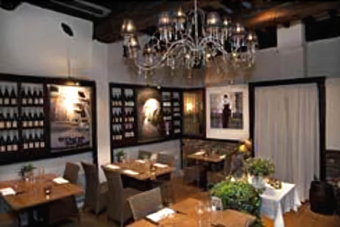 Imagen del bar/restaurante del Hotel Au Quartier. Foto 6