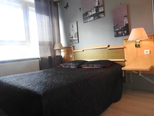 Imagen de la habitación del Hotel Au Sleeping. Foto 5