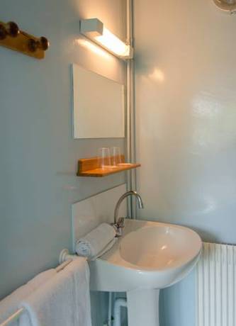 Imagen de la habitación del Hotel Au Sleeping. Foto 11