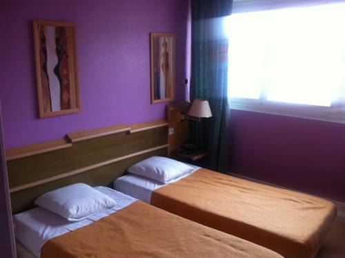 Imagen de la habitación del Hotel Au Sleeping. Foto 13