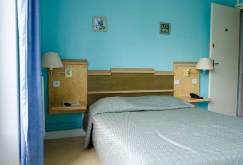 Imagen de la habitación del Hotel Au Sleeping. Foto 14