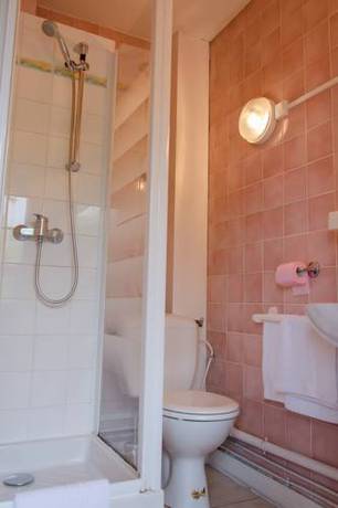 Imagen de la habitación del Hotel Au Sleeping. Foto 15