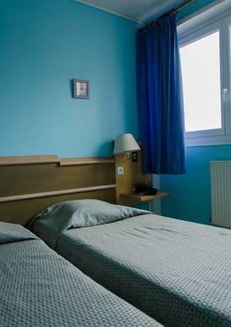 Imagen de la habitación del Hotel Au Sleeping. Foto 16