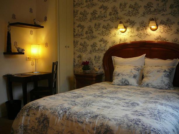 Imagen de la habitación del Hotel Au Soleil D'or. Foto 8