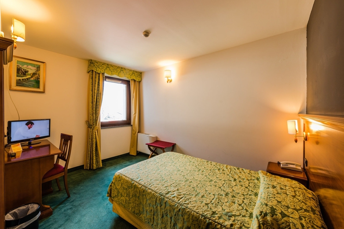 Imagen de la habitación del Hotel Au Soleil. Foto 13