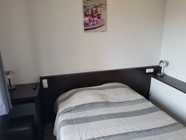 Imagen de la habitación del Hotel Au Spatial. Foto 16