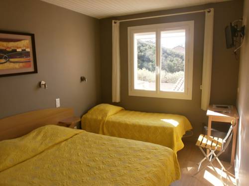 Imagen de la habitación del Hotel Au Tapis De Sable. Foto 4