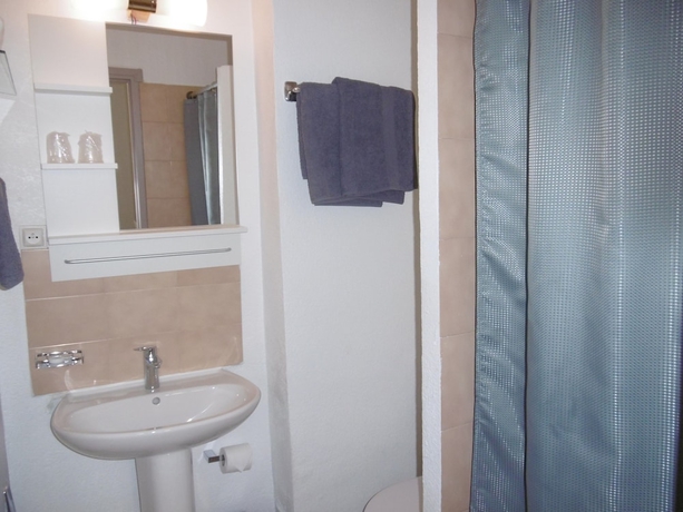 Imagen de la habitación del Hotel Au Tropico. Foto 18