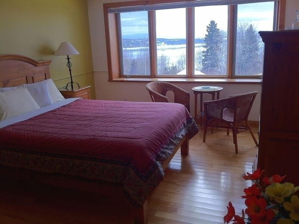 Imagen de la habitación del Hotel Auberge Cap-aux-Corbeaux. Foto 8