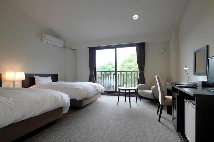 Imagen de la habitación del Hotel Auberge Cosmos. Foto 16