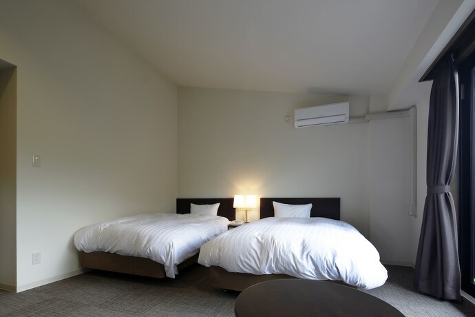 Imagen de la habitación del Hotel Auberge Cosmos. Foto 20