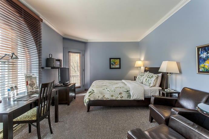 Imagen de la habitación del Hotel Auberge De La Fontaine. Foto 4